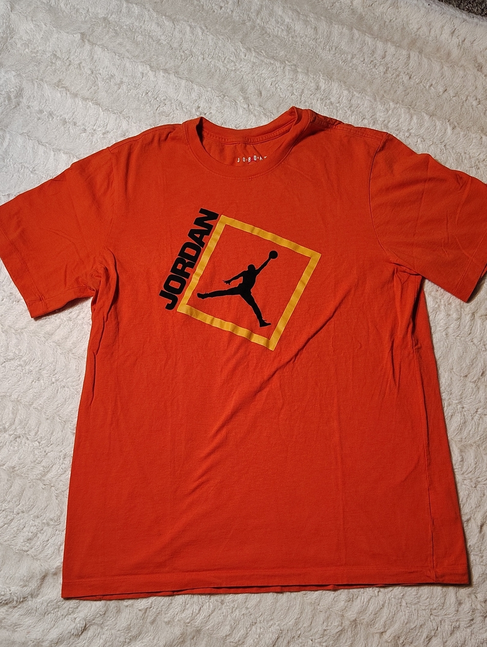 Jordan Orange Short Sleeve Tee with Black Jumpman and Yellow Frame